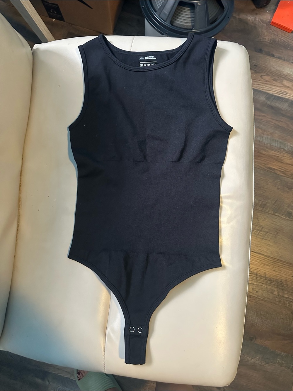 Black Sleeveless One-Piece Bodysuit